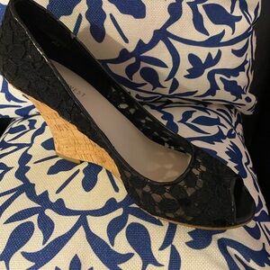 Nine West peep toe lace wedge heels. Used condition with some wear.